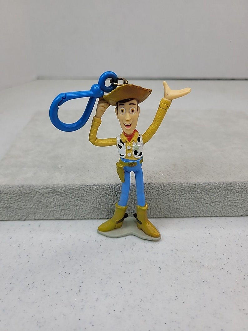 Llavero vintage de Woody de Toy Story de Disney Pixar con clip para mochila, 1995, 10 cm de alto. imagen 1
