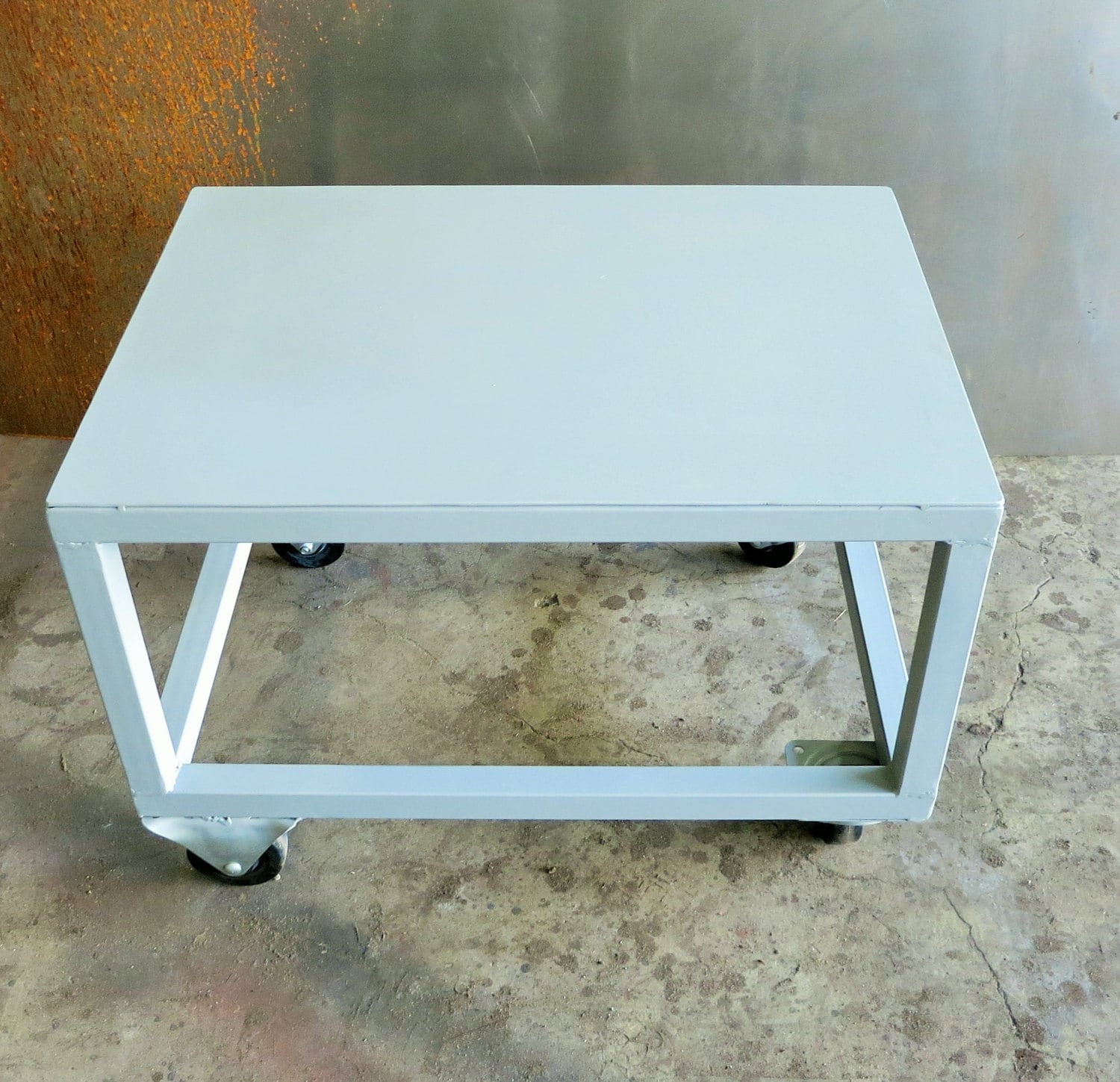 Metal table cheap with wheels