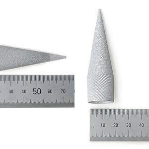 May include: Two silver metal files are displayed against a white background. One file is cone-shaped, and the other is a tapered cylinder. A ruler is placed next to each file. The cone-shaped file is approximately 2.75 inches tall.