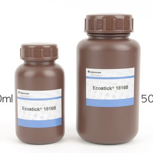 May include: Two brown plastic bottles with screw-on caps. The smaller bottle is labeled 250ml, and the larger one is labeled 500ml. Both bottles have white labels with blue stripes and the text "Ecostick 1816B".