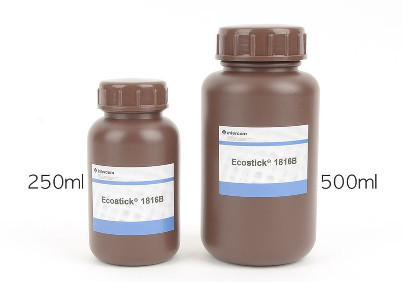 May include: Two brown plastic bottles with screw-on caps. The smaller bottle is labeled 250ml, and the larger one is labeled 500ml. Both bottles have white labels with blue stripes and the text "Ecostick 1816B".