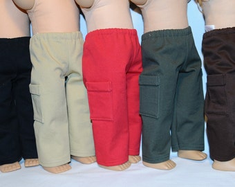 May include: Five pairs of doll-sized cargo pants in black, beige, red, green, and brown.