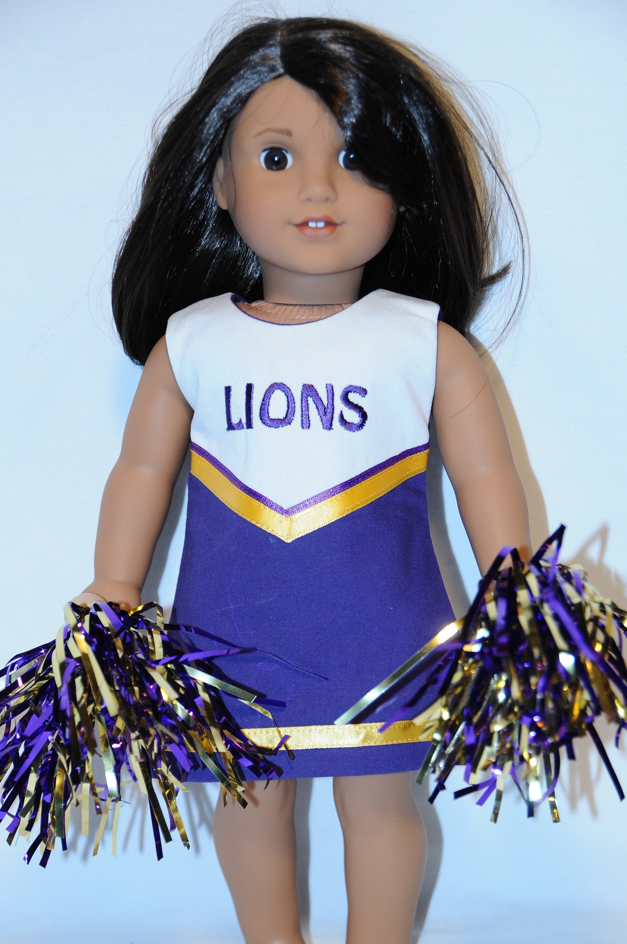 Tenue de pom-pom girl LIONS avec pompons violet/doré pour poupées