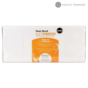 May include: A white package of HeatnBond SoftStretch Ultra fusible web adhesive. The package has a yellow and orange label with the text "What is SoftStretch?" and information about the product.