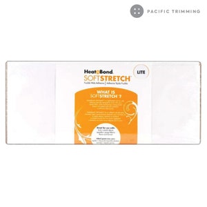 May include: A white package of HeatnBond SoftStretch Lite fusible web adhesive. The package has a yellow and orange border with the text "What is SoftStretch?" and information about the product.