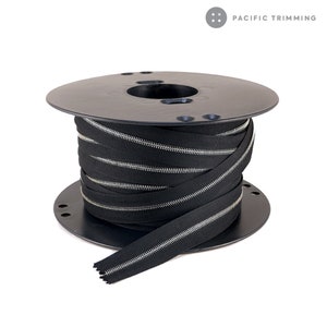 riri dragkedja kontinuerlig kedja svart tejp med nickeltänder