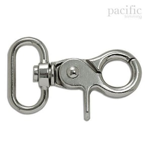 May include: Silver swivel snap hook with a D-ring. The hook is designed for attaching to a leash, strap, or other item.