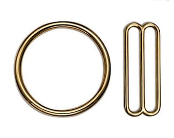 Puede incluir: Hebilla deslizante y anilla en D de metal dorado. La hebilla deslizante tiene dos bucles y la anilla en D es redonda.