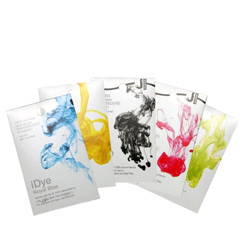 May include: Five dye packets for fabric dyeing. The packets are labeled with the color of the dye: Royal Blue, Yellow, Black, Red, and Green. The packets are on a white background.
