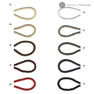May include: A selection of braided cords in various colours, including white, beige, brown, grey, black, and red. The cords are displayed in two rows, with the numbers 51, 40, 56, 72, and 08 on the left and the numbers 01, 31, 33, 23, and 14 on the right. The text "PACIFIC TRIMMING" appears at the top of the image.