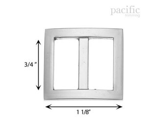 May include: Silver-toned metal buckle with a rectangular shape and a center bar. The buckle measures 1 1/8 inches wide and 3/4 inches tall.