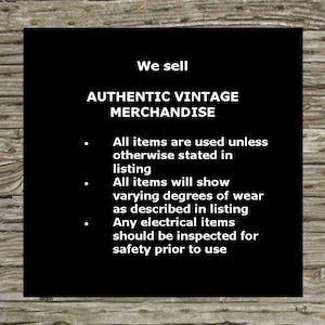 May include: Black and white text on a black background. The text reads: "We sell AUTHENTIC VINTAGE MERCHANDISE. All items are used unless otherwise stated in listing. All items will show varying degrees of wear as described in listing. Any electrical items should be inspected for safety prior to use."