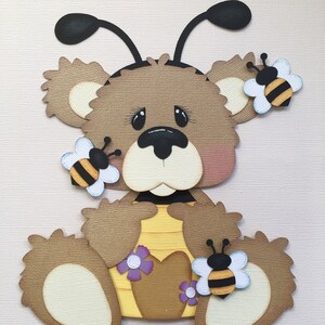 Bear holding bee hive paper piecing die cut scrapbook embellishment