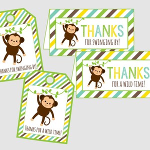May include: Two green and yellow striped thank you tags with a monkey hanging from a vine. One tag says "Thanks for swinging by!" and the other says "Thanks for a wild time!"