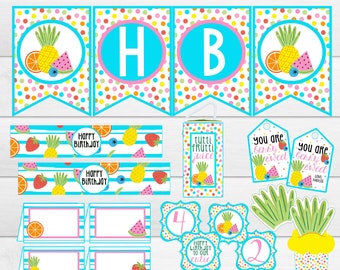 May include: A set of printable party decorations for a two-year-old's birthday. The decorations feature a fruit theme with pineapples, watermelons, strawberries, oranges, and bananas. The text on the decorations includes "Happy Birthday", "Two-Tti Frutti", "Berry Sweet Treats", and "Orange You Glad This Party Is Bananas?"