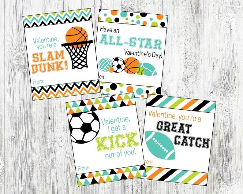 May include: Four printable Valentine's Day cards with sports themes. The cards feature a basketball, soccer ball, and football with text that says "Slam Dunk!" "All-Star" "Kick" and "Great Catch".