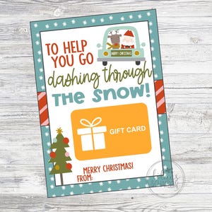 May include: A Christmas gift card design with a green Christmas tree, a red and white striped border, and the text "To help you go dashing through the snow!" and "Merry Christmas!" with a gift card icon.