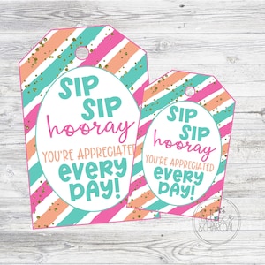May include: Two pink and blue striped gift tags with gold glitter. The larger tag says "SIP SIP hooray YOU'RE APPRECIATED every DAY!" The smaller tag says "SIP SIP hooray YOU'RE APPRECIATED every DAY!"