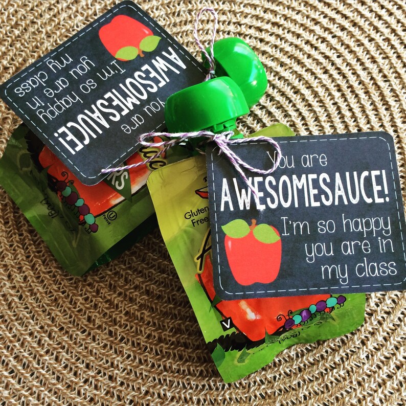May include: Two small pouches of apple sauce with a chalkboard tag tied to them. The tag says "You are AWESOMESAUCE! I'm so happy you are in my class".
