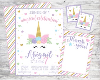 May include: A set of unicorn-themed party invitations and thank you cards. The invitation features a unicorn head with a gold horn, floral accents, and the text "Join us for a magical celebration". The invitation is for Abigail's 7th birthday.