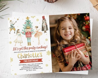 May include: A Nutcracker-themed birthday invitation with a watercolour illustration of the Nutcracker, a Christmas tree, and a ballerina. The invitation has a gold glitter background and the text "Let's get this party cracking!" and "Charlotte's 2nd Birthday".