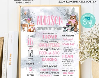 May include: A printable first birthday poster for a girl named Addison. The poster features a woodland animal theme with a pink and gray color scheme. It includes details like her age, height, weight, favorite foods, and things she can say and do. The poster is customizable with Corjl.