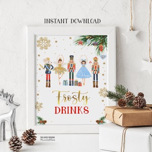 May include: Printable sign featuring a Nutcracker theme with the text "Frosty Drinks". The sign features a group of Nutcracker characters, including a mouse, a ballerina, and a soldier, all in festive attire. The background is white with gold snowflakes and stars.