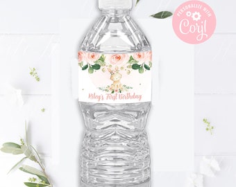 May include: A clear plastic water bottle with a custom label. The label features a floral design with peach-colored roses and a cartoon bunny. The text "Riley's First Birthday" is printed in pink.