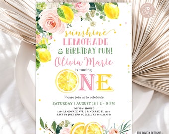 May include: A printable invitation for a first birthday party with a lemonade theme. The invitation features a pink and yellow color scheme with lemons, flowers, and the text "sunshine lemonade & birthday fun! Olivia Marie is turning one".