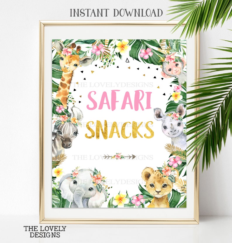 May include: A printable sign with a pink and gold safari theme. The sign says "Safari Snacks" and features a variety of jungle animals including a giraffe, zebra, rhino, monkey, elephant, and lion. The animals are surrounded by tropical leaves and flowers.