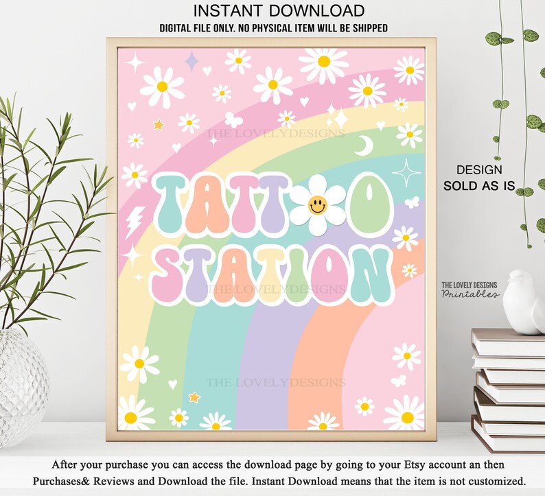 May include: A printable sign with a rainbow background and white daisies. The sign says "Tattoo Station" in a retro font with a smiley face.