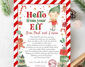 May include: A red and white striped printable Christmas card with a cartoon elf and the text "Hello from your Elf". The card is personalized with the names "Paul and Emma" and the date "December 6th, 2022".