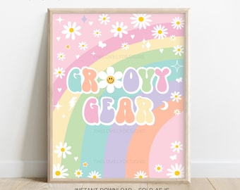 May include: A digital printable featuring a rainbow with a groovy gear text overlay. The rainbow is made up of pastel colors and is decorated with daisies and stars. The text is in a retro font and is in a light pink, green, yellow, and purple color scheme.