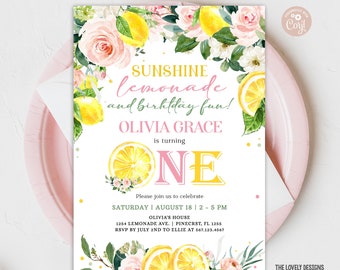 May include: A birthday invitation with a lemon and floral design. The invitation features the text "Sunshine lemonade and birthday fun!" and details for a first birthday celebration. The design includes watercolor lemons, pink roses, and green leaves.