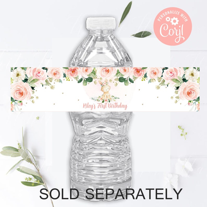 May include: Water bottle label featuring a pink floral design and a bunny illustration. The label reads "Riley's First Birthday".