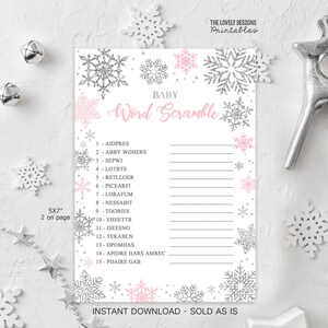 May include: A printable baby shower game with a winter theme. The game is called "Word Scramble" and features a pink and silver snowflake design. The game includes 15 words to unscramble.