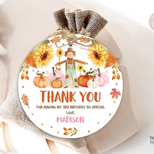 May include: Round white thank you tag with a watercolour illustration of a scarecrow, pumpkins, sunflowers, and autumn leaves. The text reads "Thank You for making my 3rd birthday so special. Love, Madison."