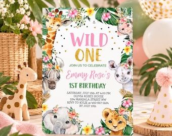 May include: A rectangular birthday invitation card featuring a white background with illustrations of a giraffe, zebra, monkey, rhino, elephant, and lion cub adorned with tropical flowers. The text reads WILD ONE, JOIN US TO CELEBRATE Emmy Rose's 1ST BIRTHDAY, SATURDAY, JULY 15th AT 4:00 PM, OLIVIA ROSE'S HOUSE, 234 MARSALA STREET NW, RSVP TO KYLIE AT 450-567-1234 BY JULY 10th.