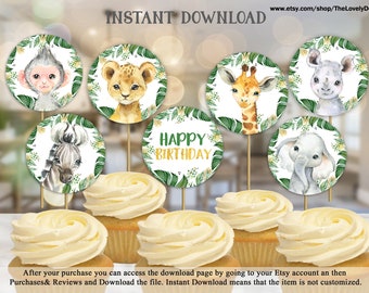 May include: Set of 7 printable cupcake toppers featuring jungle animals, including a lion, giraffe, zebra, monkey, rhino, and elephant. The toppers are decorated with green leaves and flowers. The text "Happy Birthday" is featured on one of the toppers.