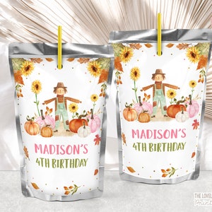 May include: Two juice pouches with a fall-themed design. Each pouch features a scarecrow, pumpkins, sunflowers, and the text "MADISON'S 4TH BIRTHDAY". The pouches have yellow straws and are decorated with autumn leaves.