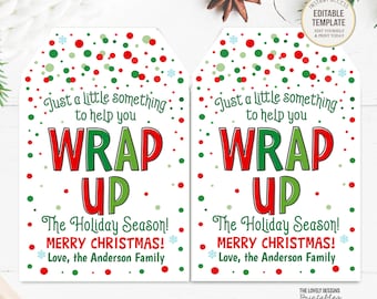 May include: Two printable gift tags with a red and green polka dot background. The text on the tags reads "Just a little something to help you wrap up. The Holiday Season! Merry Christmas! Love, the Anderson Family."