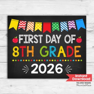 May include: A chalkboard-style sign featuring a colorful pennant banner at the top. The text reads FIRST DAY OF 8TH GRADE 2026 in white and multi-colored letters. Two red apples are positioned on either side of the text, with a dotted line below.