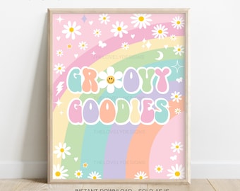 May include: A printable digital download featuring a rainbow with a groovy goodies text overlay. The text is in a retro font with a daisy flower in the middle of the 'O' in groovy. The background is pink with white daisies and stars.