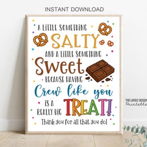 May include: A framed print with the text "A Little Something Salty and a Little Something Sweet." The print includes illustrations of pretzels and chocolate, with the words "Crew like you is a REALLY BIG TREAT!" and "Thank you for all that you do!"