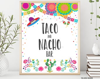 May include: Printable sign with a colorful Mexican theme. The sign says "Taco and Nacho Bar" with a sombrero, maracas, and cactus illustrations.