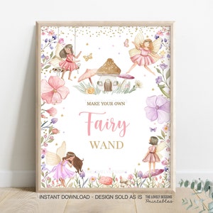 May include: A printable sign with a white background and a gold glitter border. The sign features a watercolor illustration of fairies, flowers, and a mushroom house. The text "Make your own Fairy Wand" is written in pink and gold lettering.
