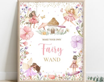 May include: A printable sign with a white background and a gold glitter border. The sign features a watercolor illustration of fairies, flowers, and a mushroom house. The text "Make your own Fairy Wand" is written in pink and gold lettering.