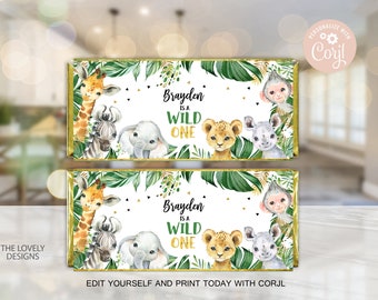 May include: Two printable chocolate bar wrappers with a jungle theme. The wrappers feature a white background with green leaves, gold accents, and illustrations of a giraffe, zebra, elephant, lion, and monkey. The text on the wrappers reads "Brayden is a Wild One".