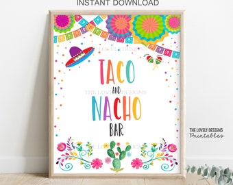 May include: A printable sign with a white background and colorful text that reads "Taco and Nacho Bar". The sign is decorated with colorful flowers, a sombrero, maracas, and confetti. The text "The Lovely Designs Printables" is at the bottom of the sign.