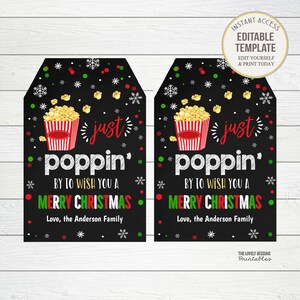 May include: Two black and white printable gift tags with a red and white popcorn bucket, snowflakes, and the text "just poppin' by to wish you a Merry Christmas. Love, the Anderson Family."